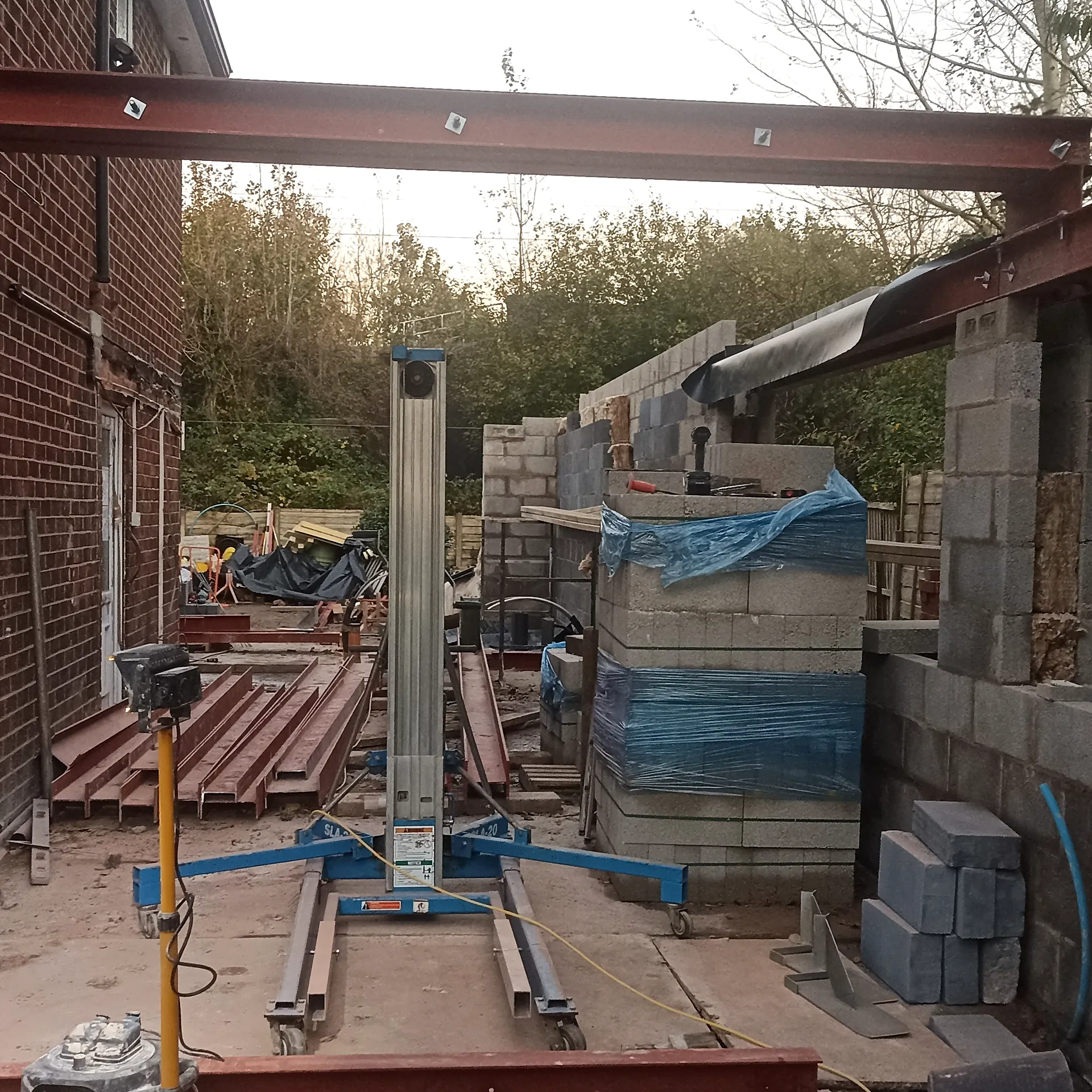 Steel members and blockwork during extension construction