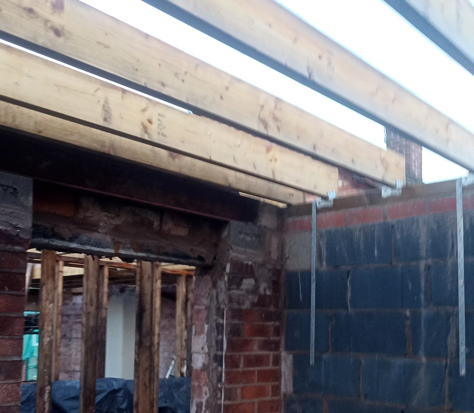 Timber extension roof structure before enclosure