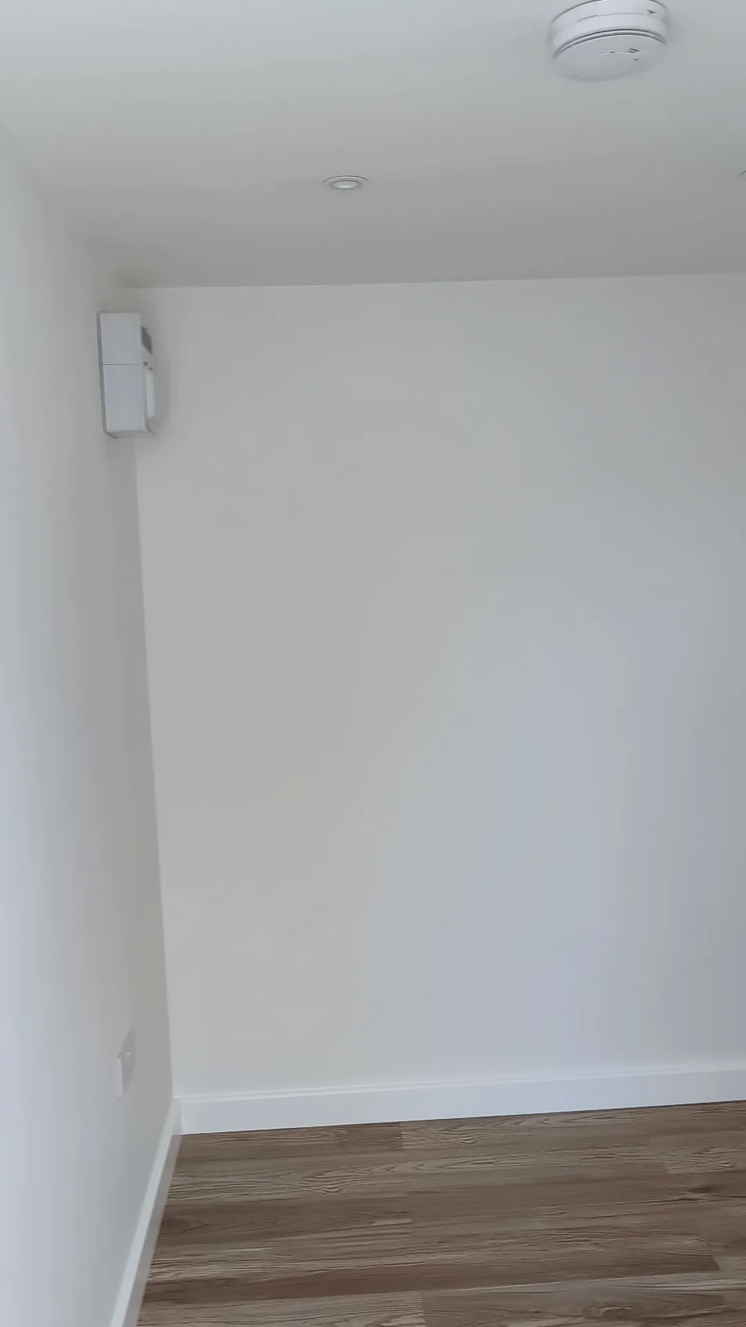Finished garden room interior with lighting, wall finish and flooring