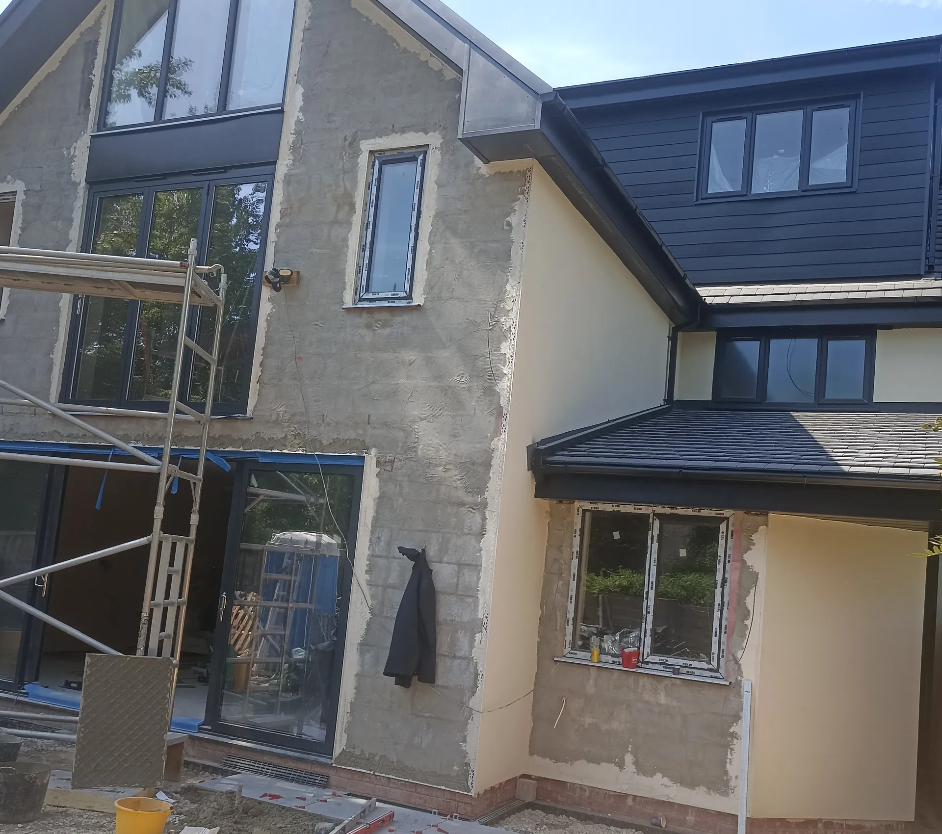 Rear elevation, new glazing and roof forms during external rendering.